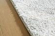 Unawick Large Rug - National Warehouse Furniture (Buffalo, NY)
