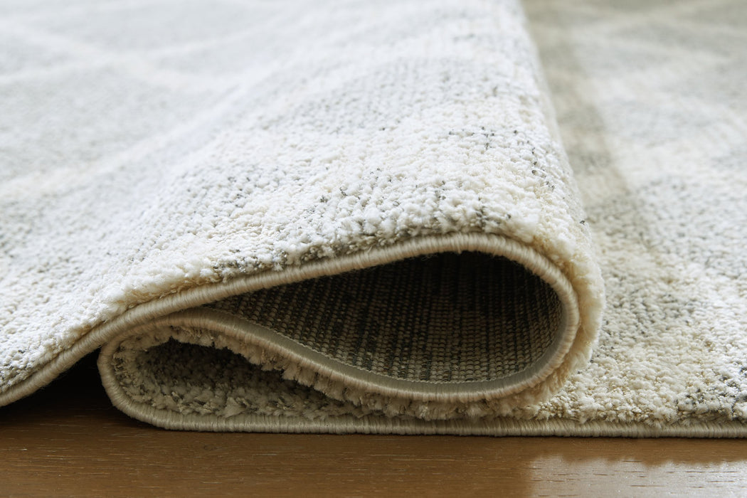 Unawick Large Rug - National Warehouse Furniture (Buffalo, NY)
