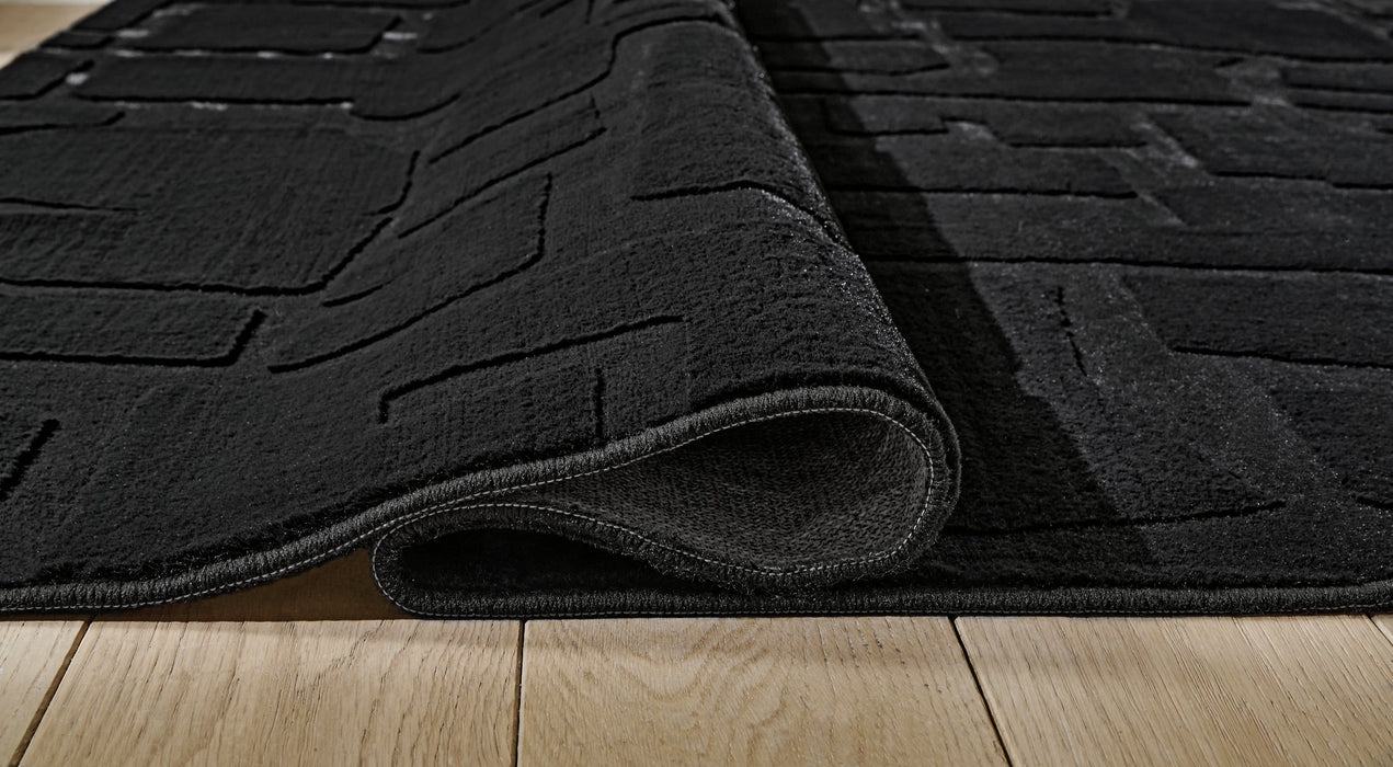 Gibbswell Washable Area Rug - National Warehouse Furniture (Buffalo, NY)
